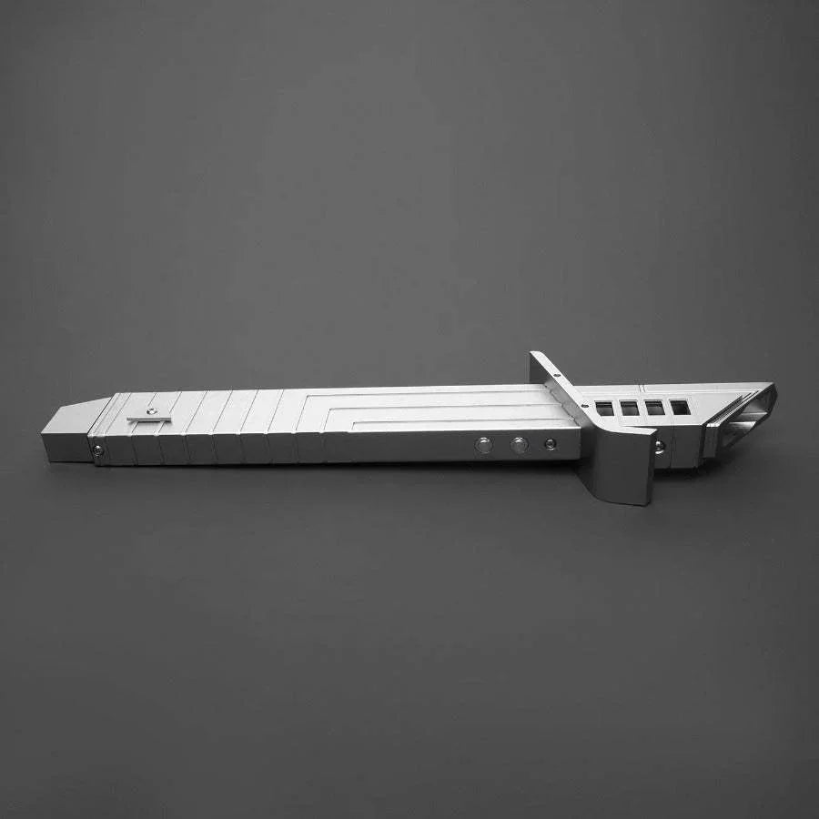 Replica lightsaber hilt inspired by Ezra Bridger from Star Wars on a dark background