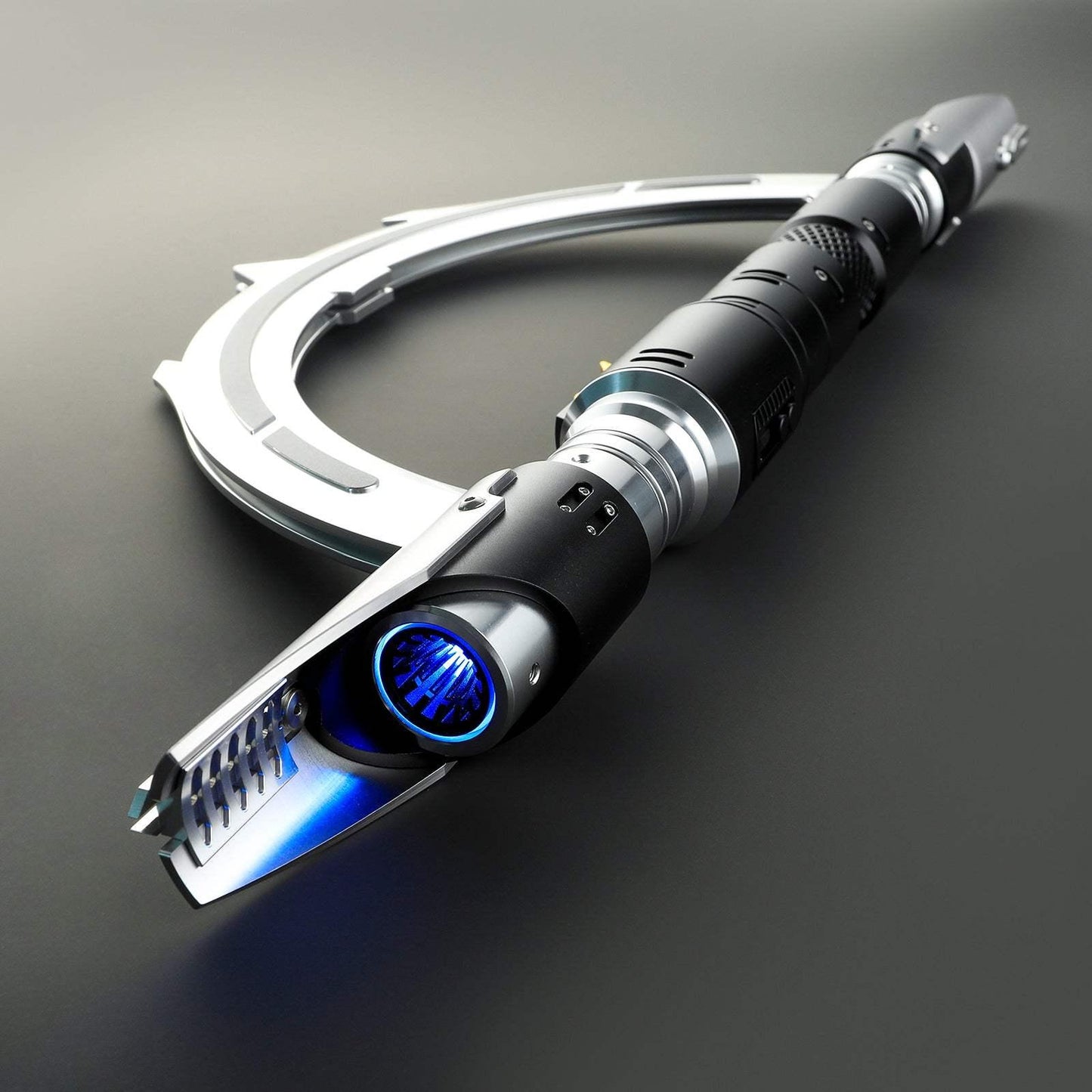 Trilla Suduri Inquisitor lightsaber replica with blue blade, circular hilt design