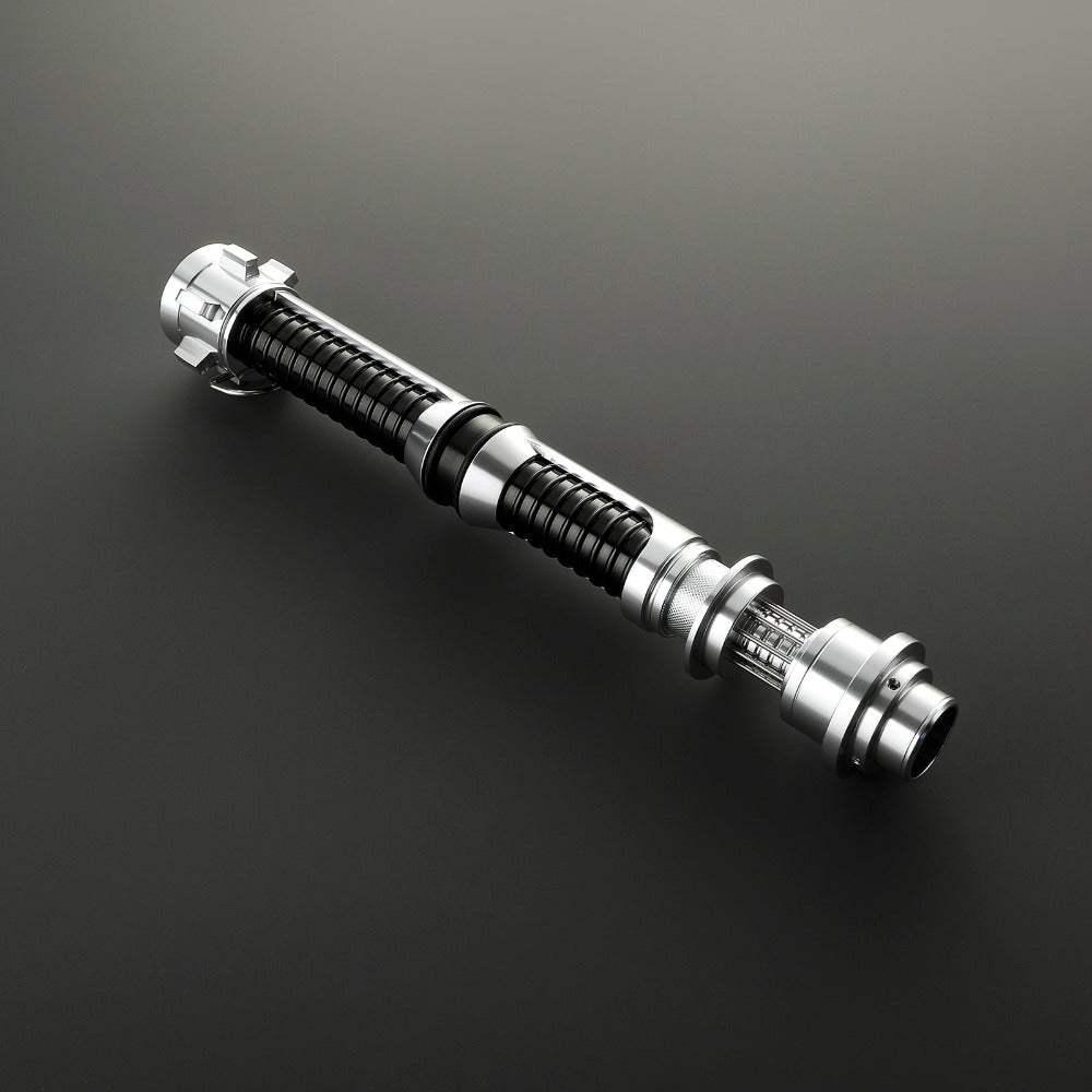 Darth Maul double-bladed lightsaber hilt with black and silver design on black background