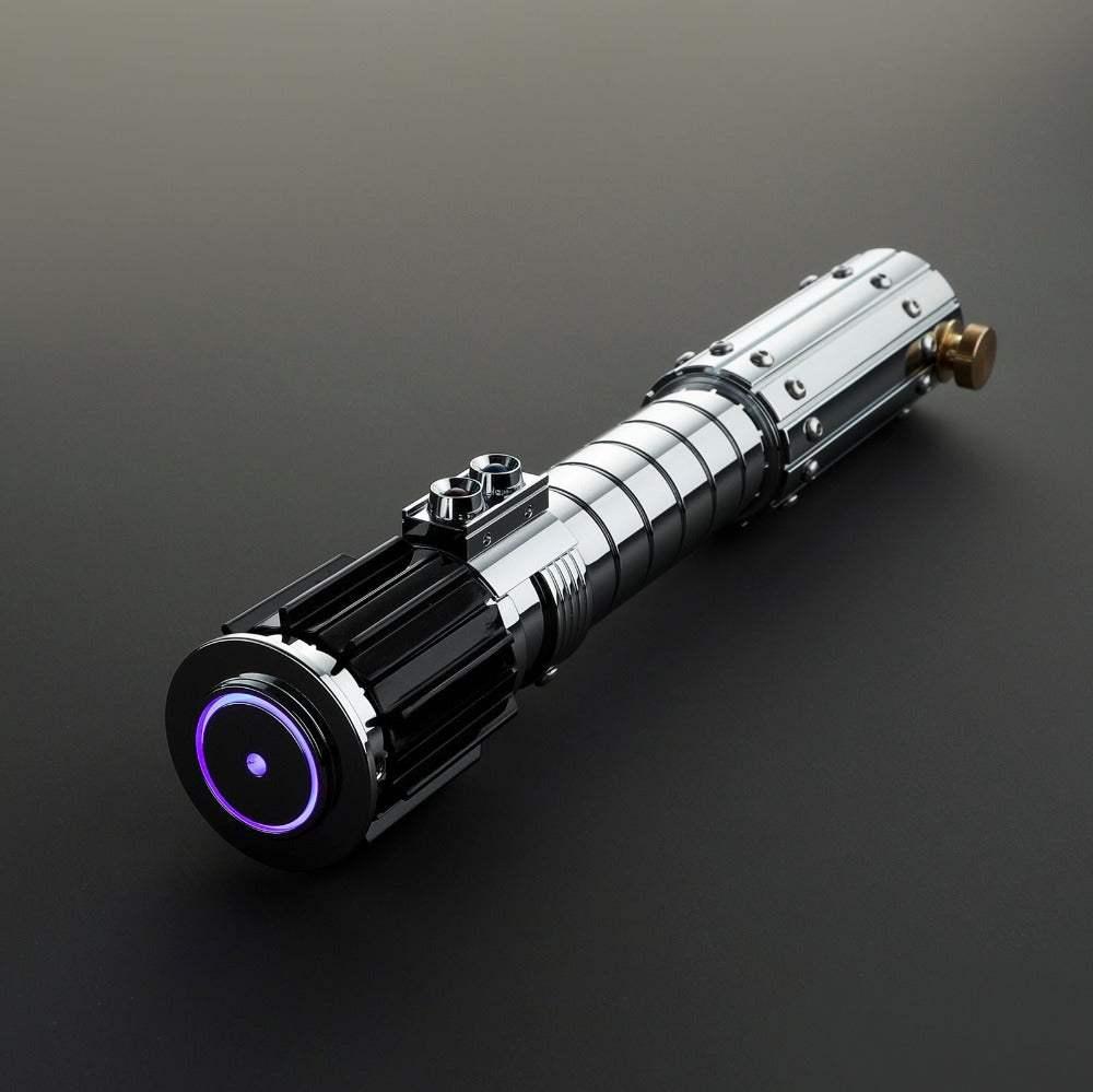 Replica lightsaber hilt inspired by Luke Skywalker, silver and black, detailed design on gray background.