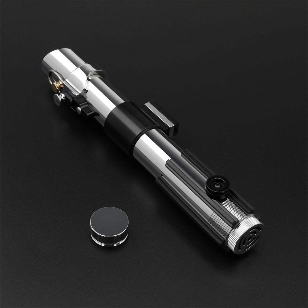 Luke Skywalker lightsaber hilt replica with chrome and black design on black background