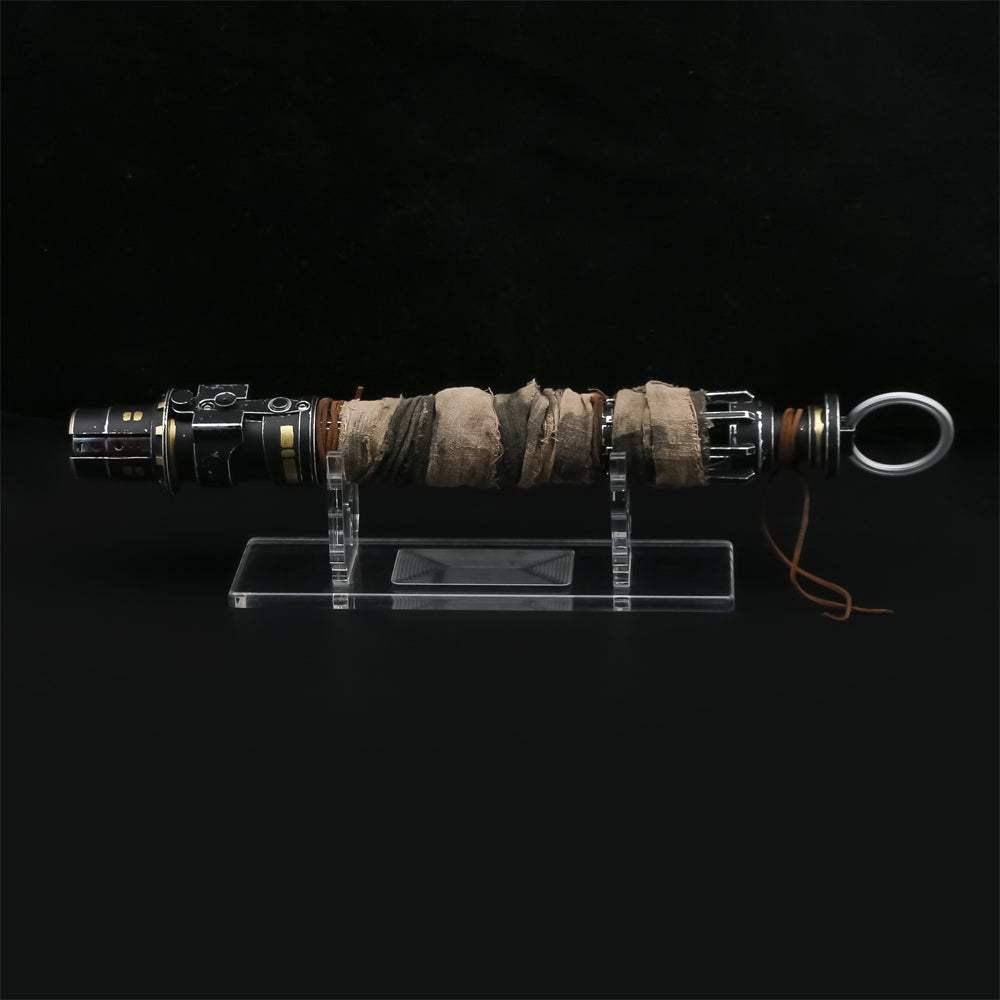 Cal Kestis inspired lightsaber hilt with wrapped grip on display, black background