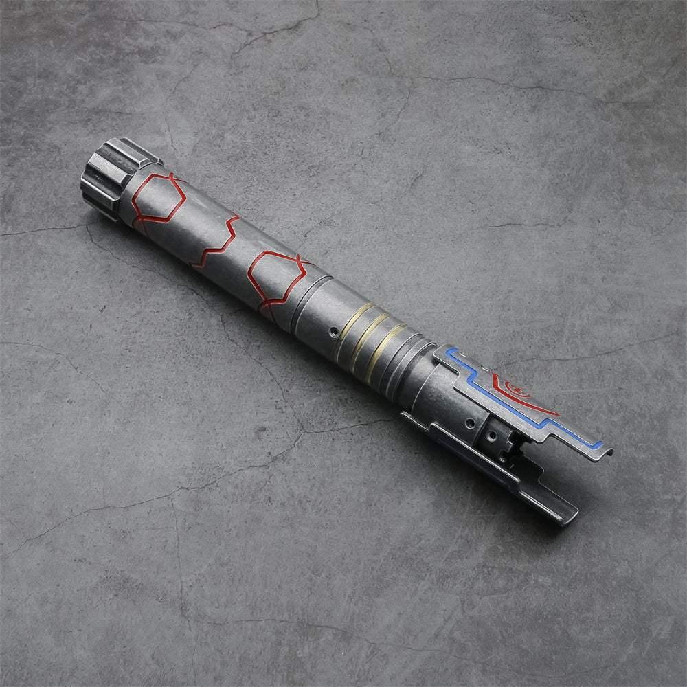 Custom lightsaber inspired by Cal Kestis from Star Wars, metallic hilt with red accents