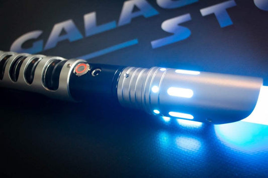 Obi-Wan Kenobi lightsaber replica with blue Neopixel blade, illuminated on display